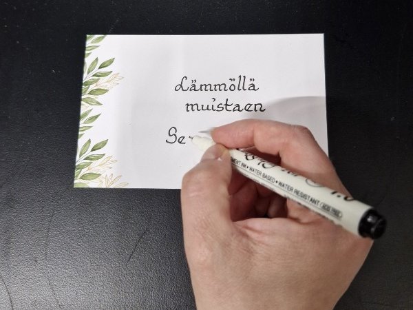 Surukortti hautajaiskukkiin